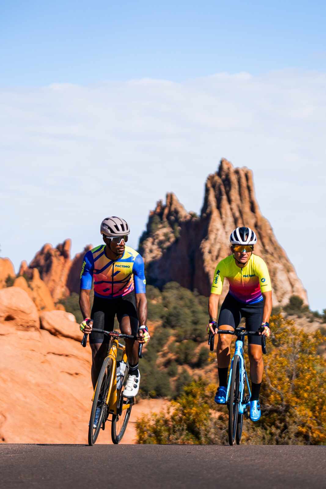 Cyclists in 90s Colors Riding in Garden of the Gods