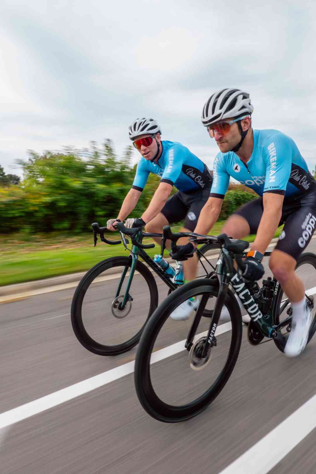 Coppi Cycling Teammates Riding Together