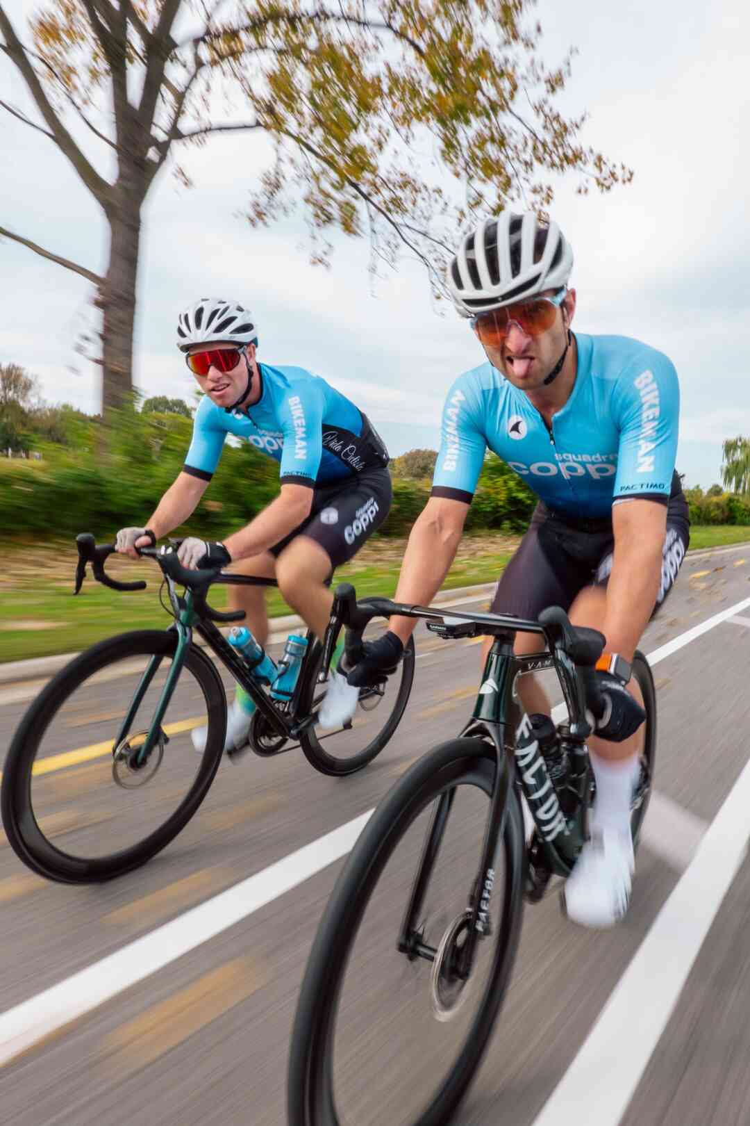 Coppi Cycling Teammates Riding