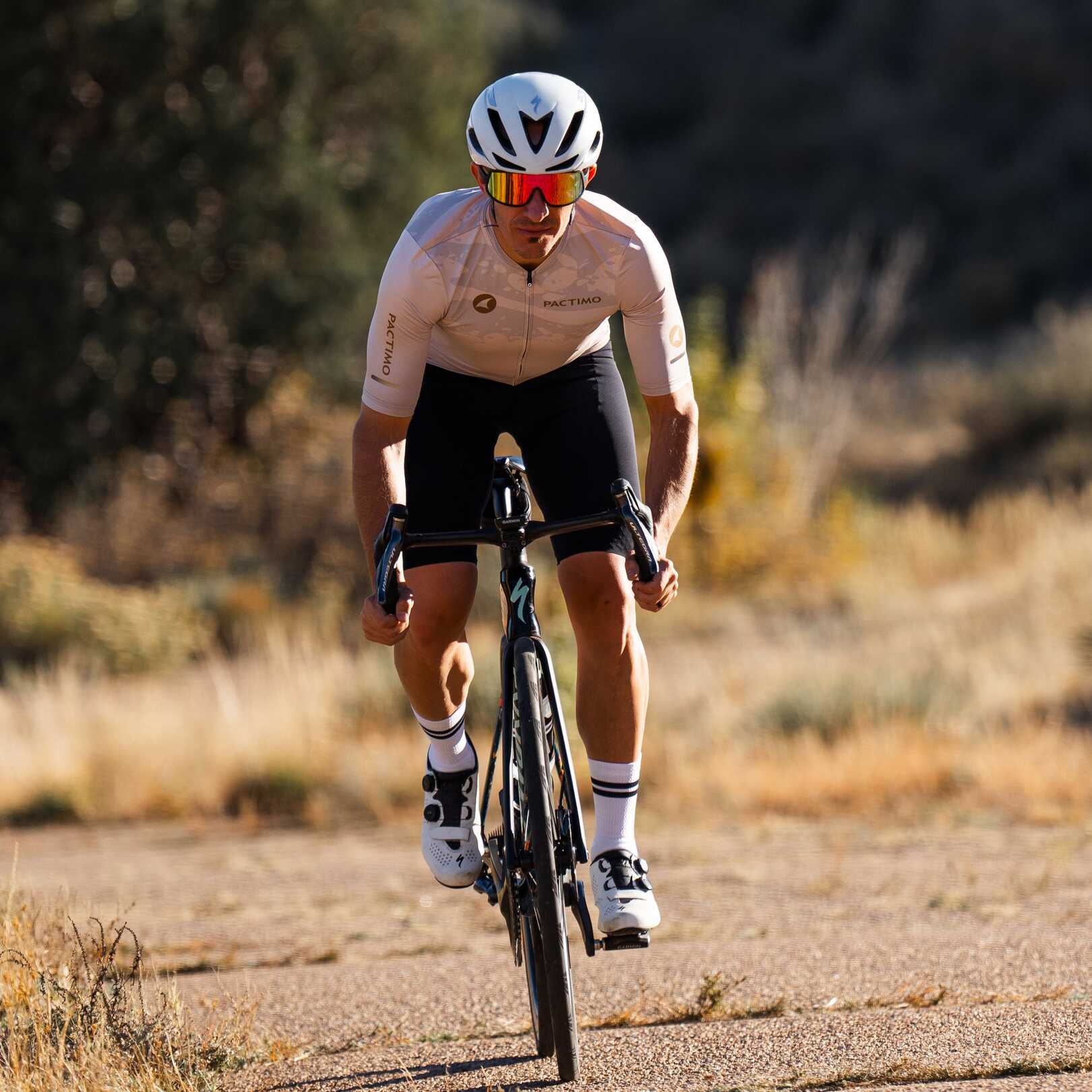 Cyclist wearing lightweight jersey and bibs