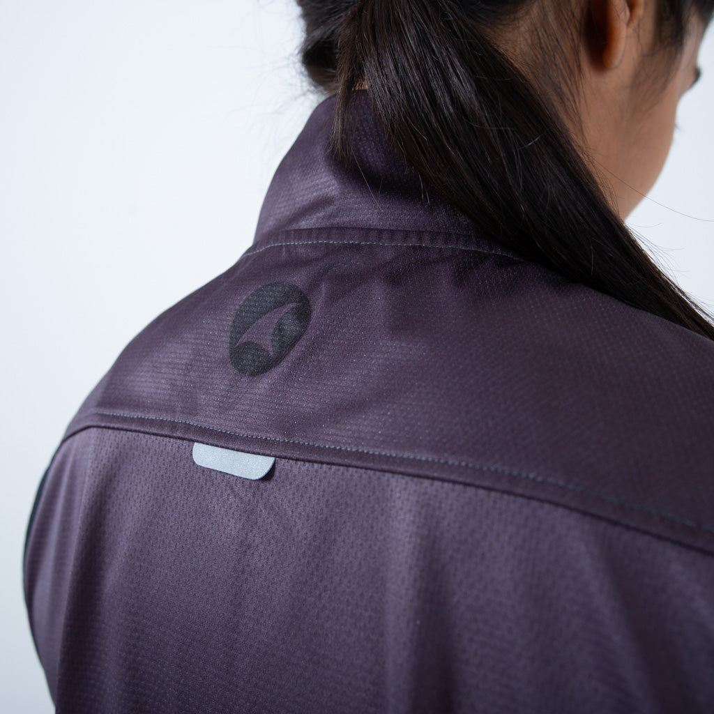 Women's Cool Weather Cycling Vest With Pockets Reflective Tab Detail #color_charcoal