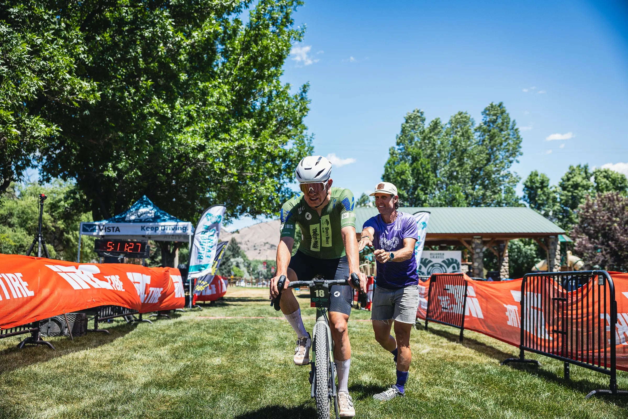 Sam Brown crossing the Bighorn Gravel finish line in 2nd place with a time of 5 hours 11 minutes