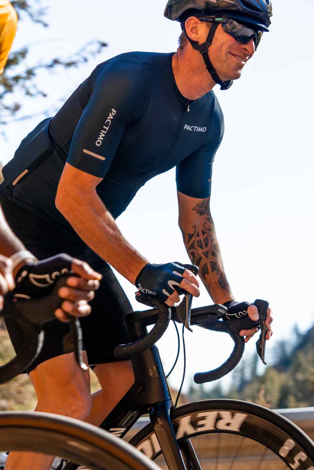 Navy Blue Cycling Gloves on Cyclist