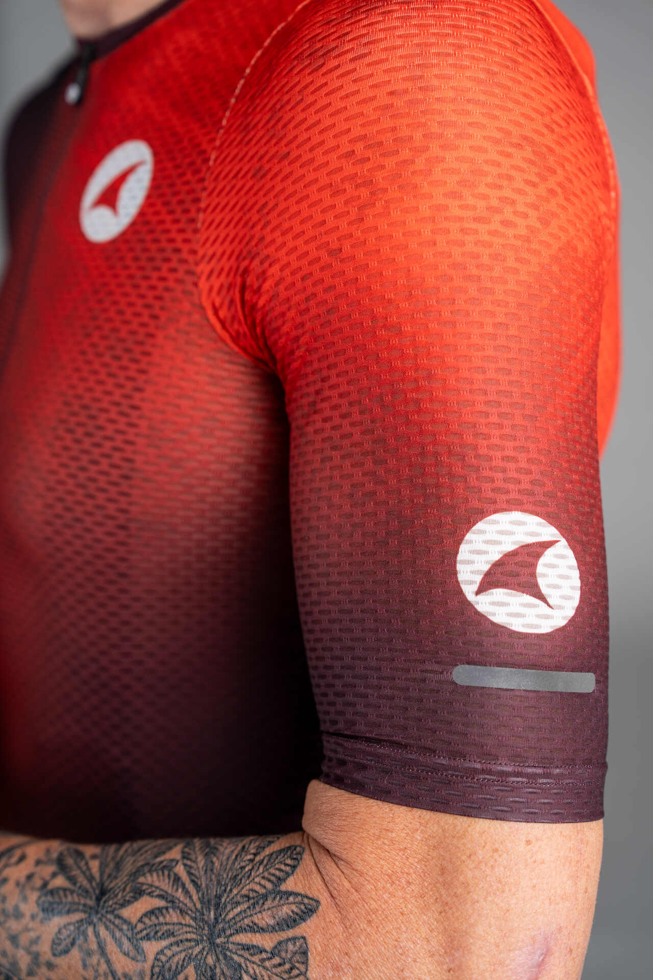 Men's Maroon and Red Range Aero Cargo Mesh Cycling Jersey - Sleeve Close-Up