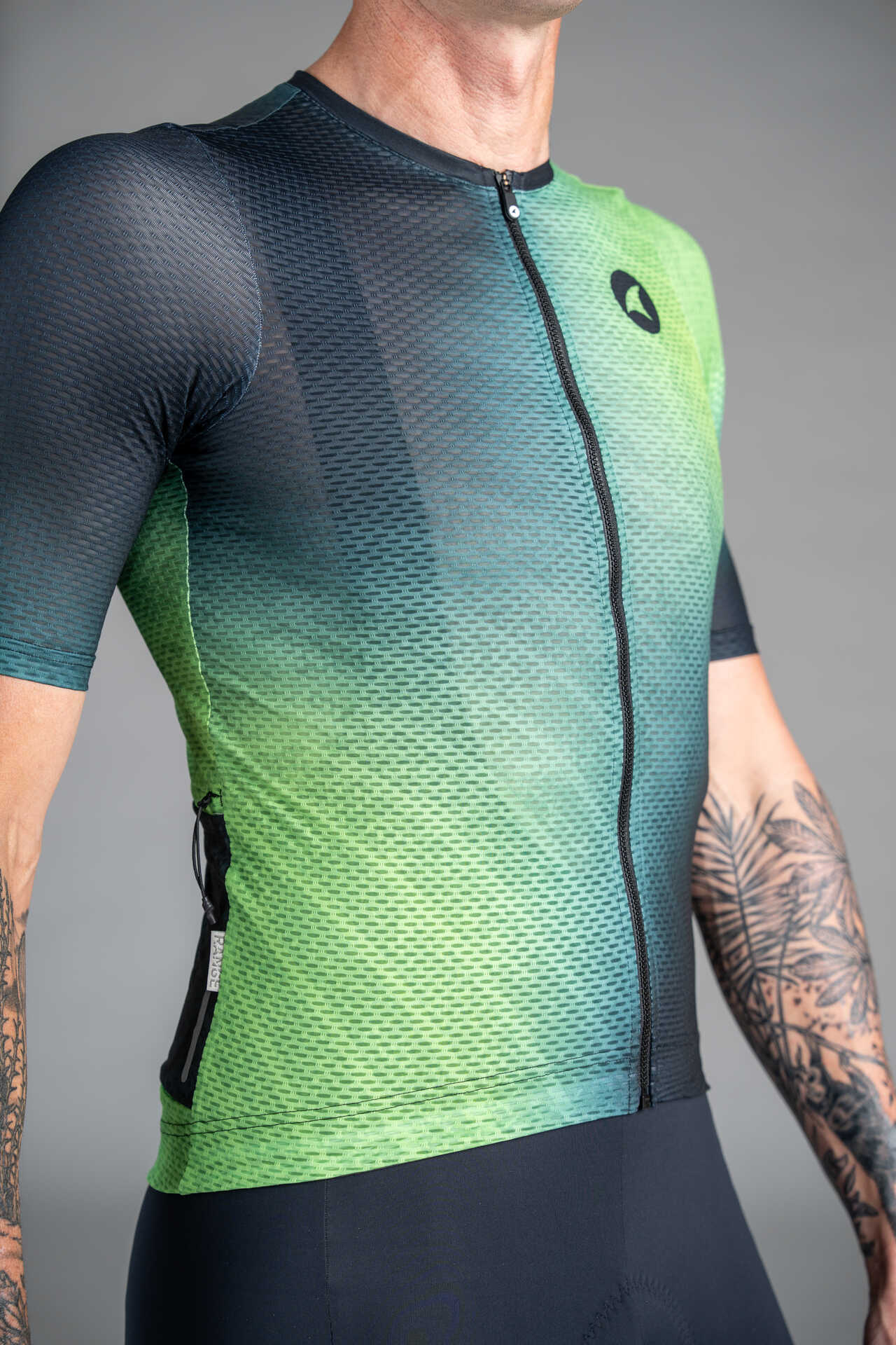 Men's Black and Green Range Aero Cargo Mesh Cycling Jersey - Side View