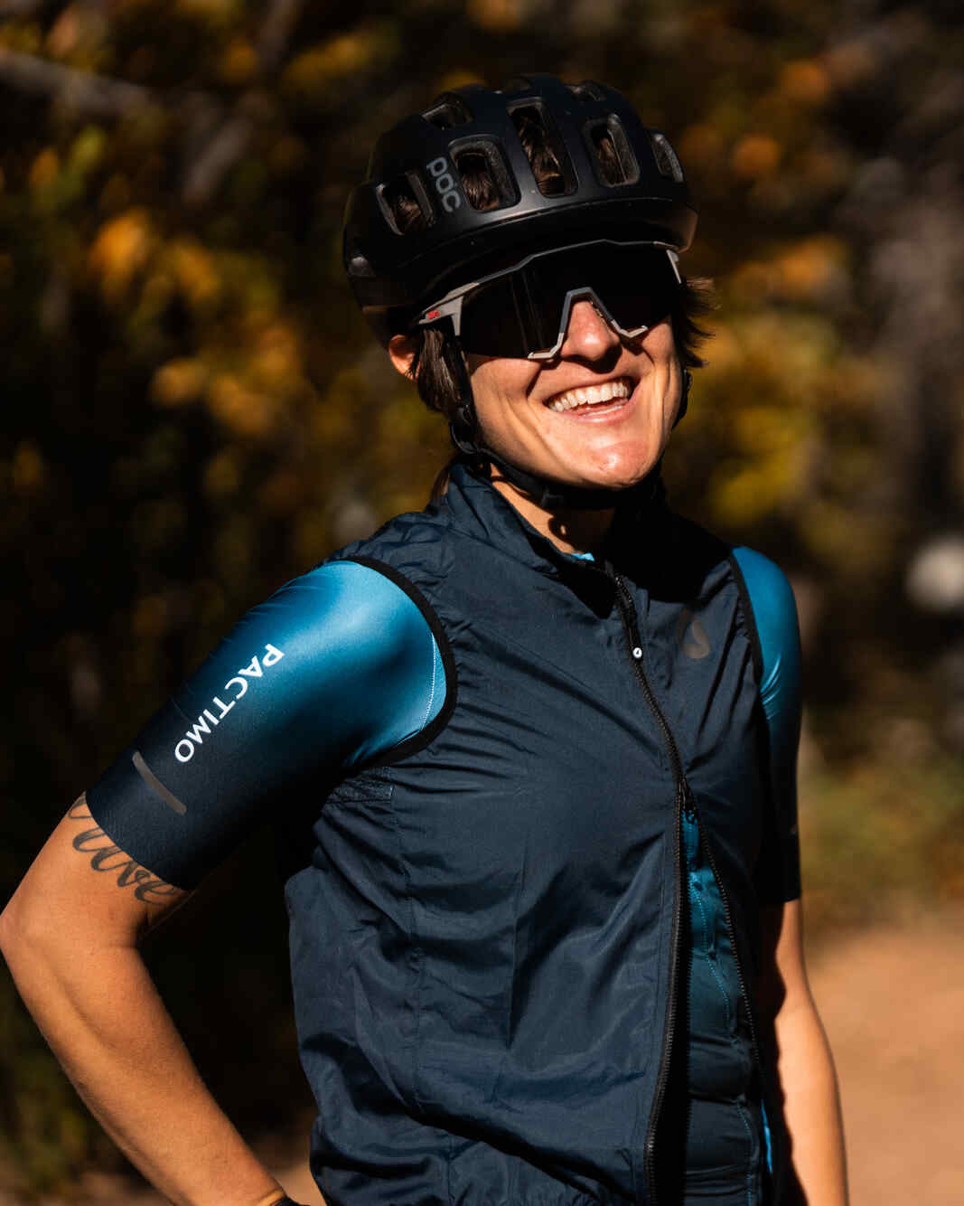 Cyclist wearing Women's Navy Blue Cycling Wind Vest