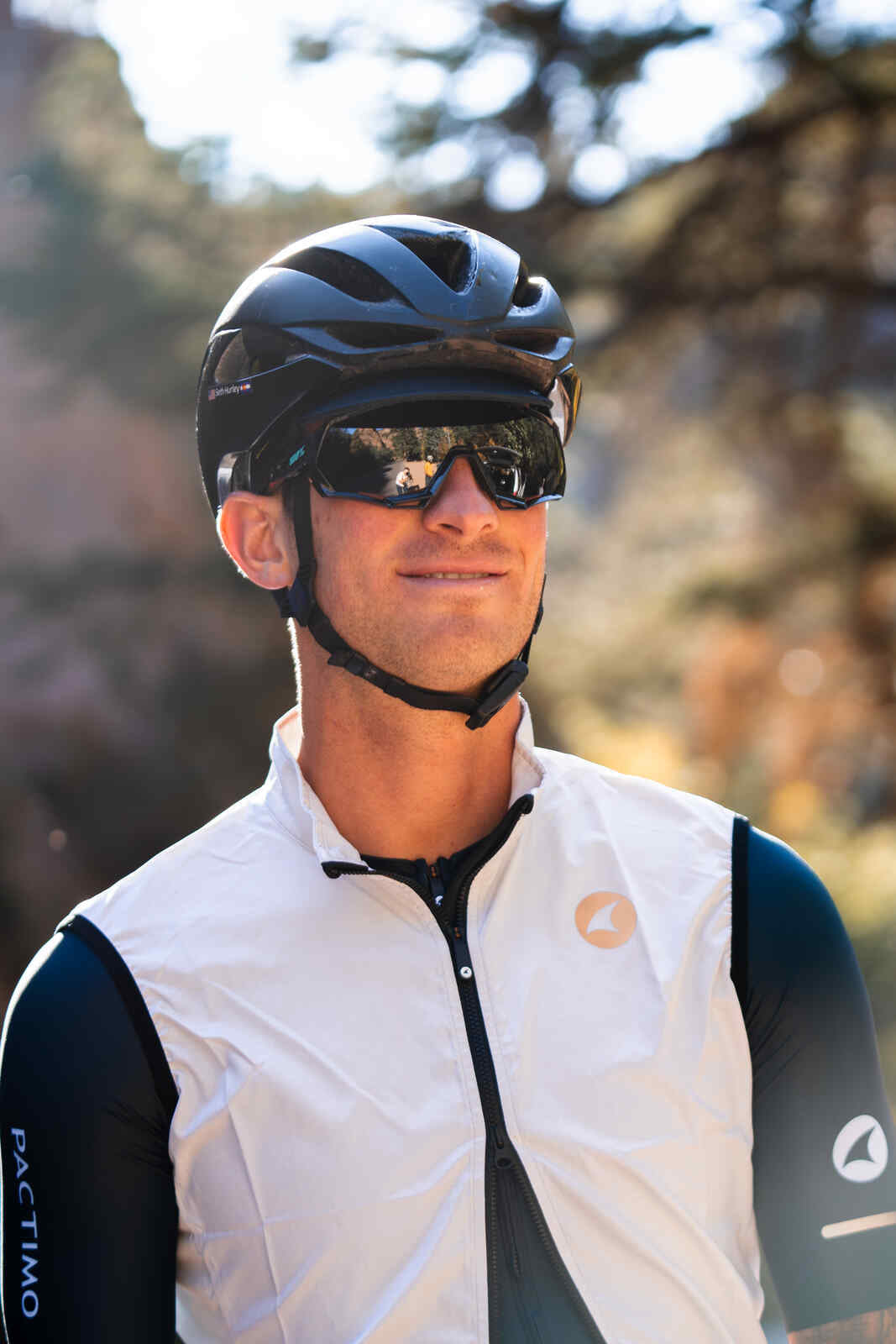 Cyclist in a Men's White Cycling Wind Vest