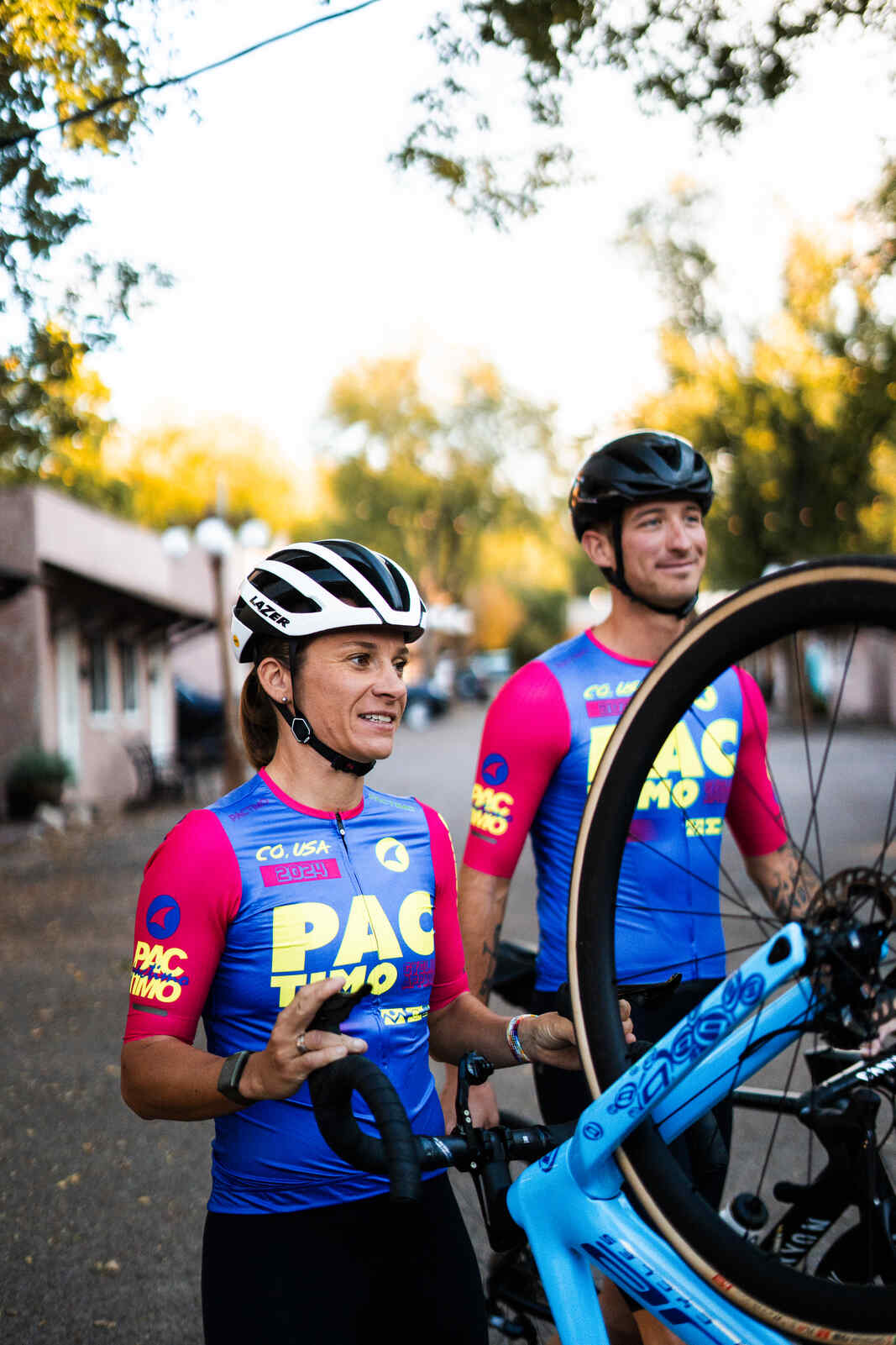 Cyclist in a Women's High-Viz Blue Flyte Cycling Jersey