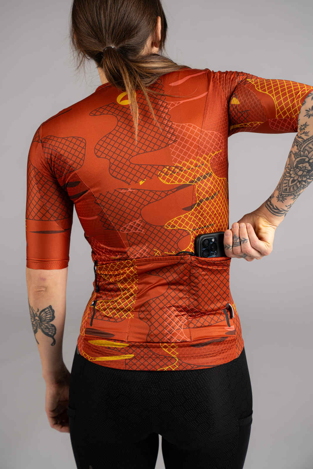 Women's Burnt Orange Gravel Cycling Jersey - Back Pockets