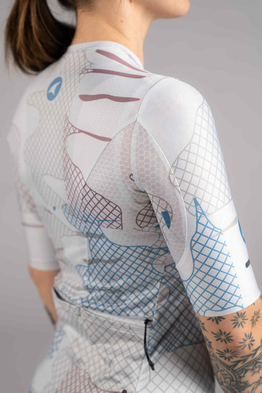 Women's White Gravel Cycling Jersey - Underarm Mesh Fabric Close-Up