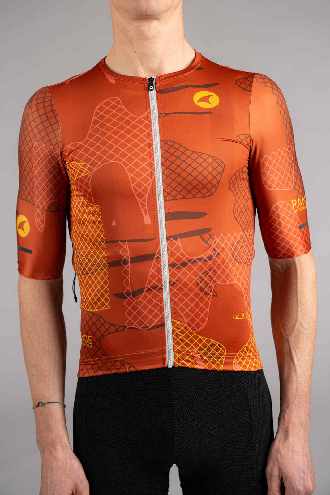 Men's Burnt Orange Gravel Cycling Jersey - Front Zipper Close-Up