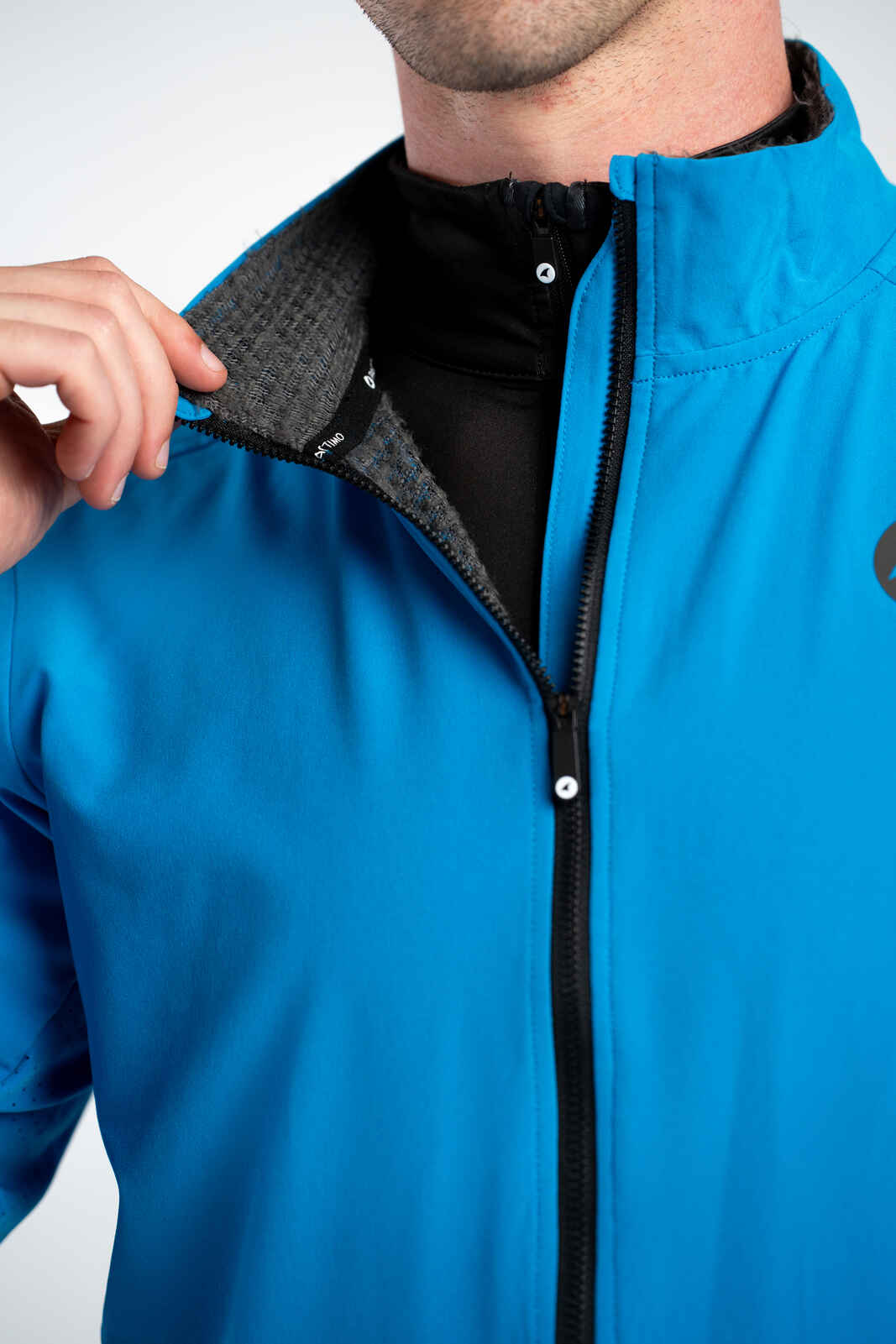 Men's Bright Blue Thermal Cycling Jacket - Fill and Zipper Detail