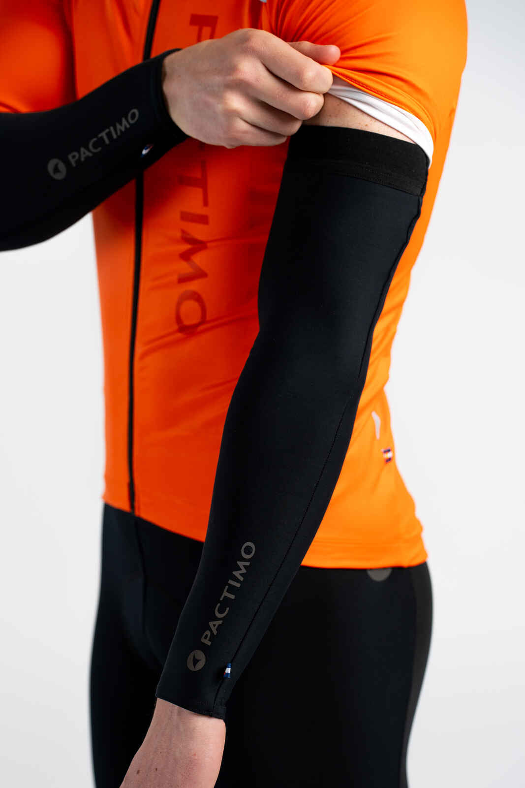 Water Repelling Cycling Arm Warmers - Pulling Under Sleeves