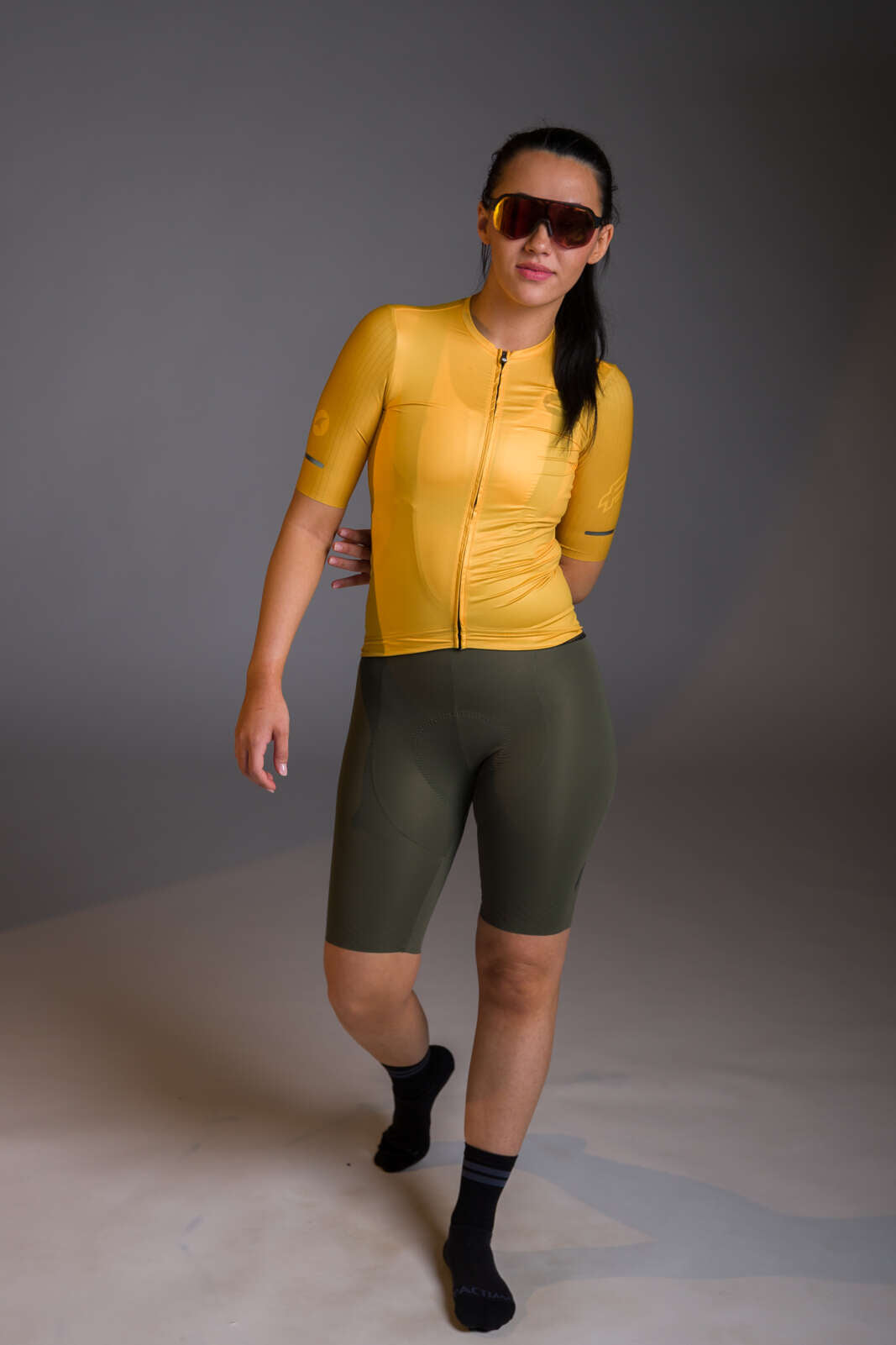 Women's Olive Green Cycling Bibs - Flyte Paired with a Yellow/Orange Jersey