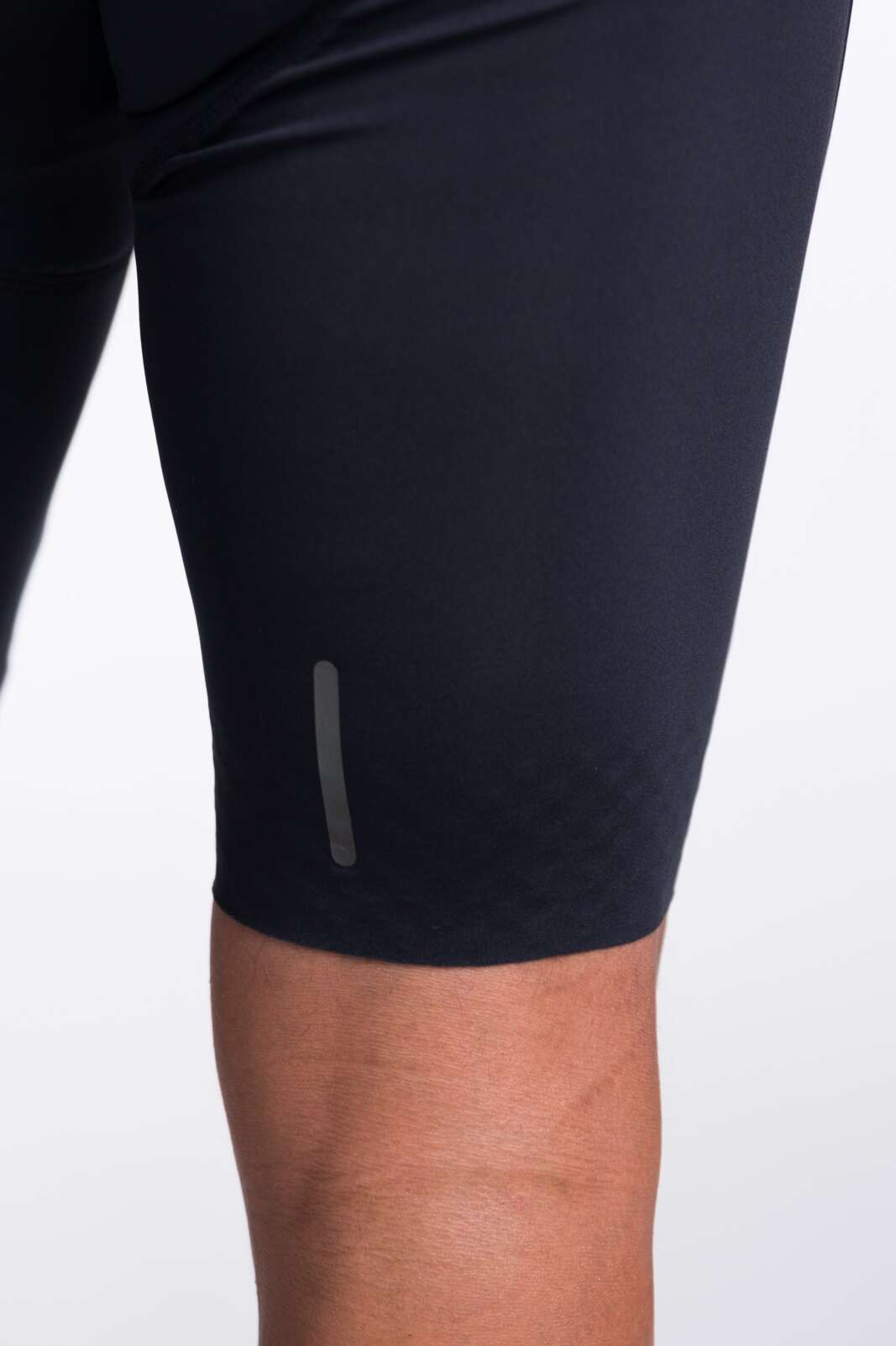 Black Minimalistic Cycling Bib Shorts - Leg Close-Up