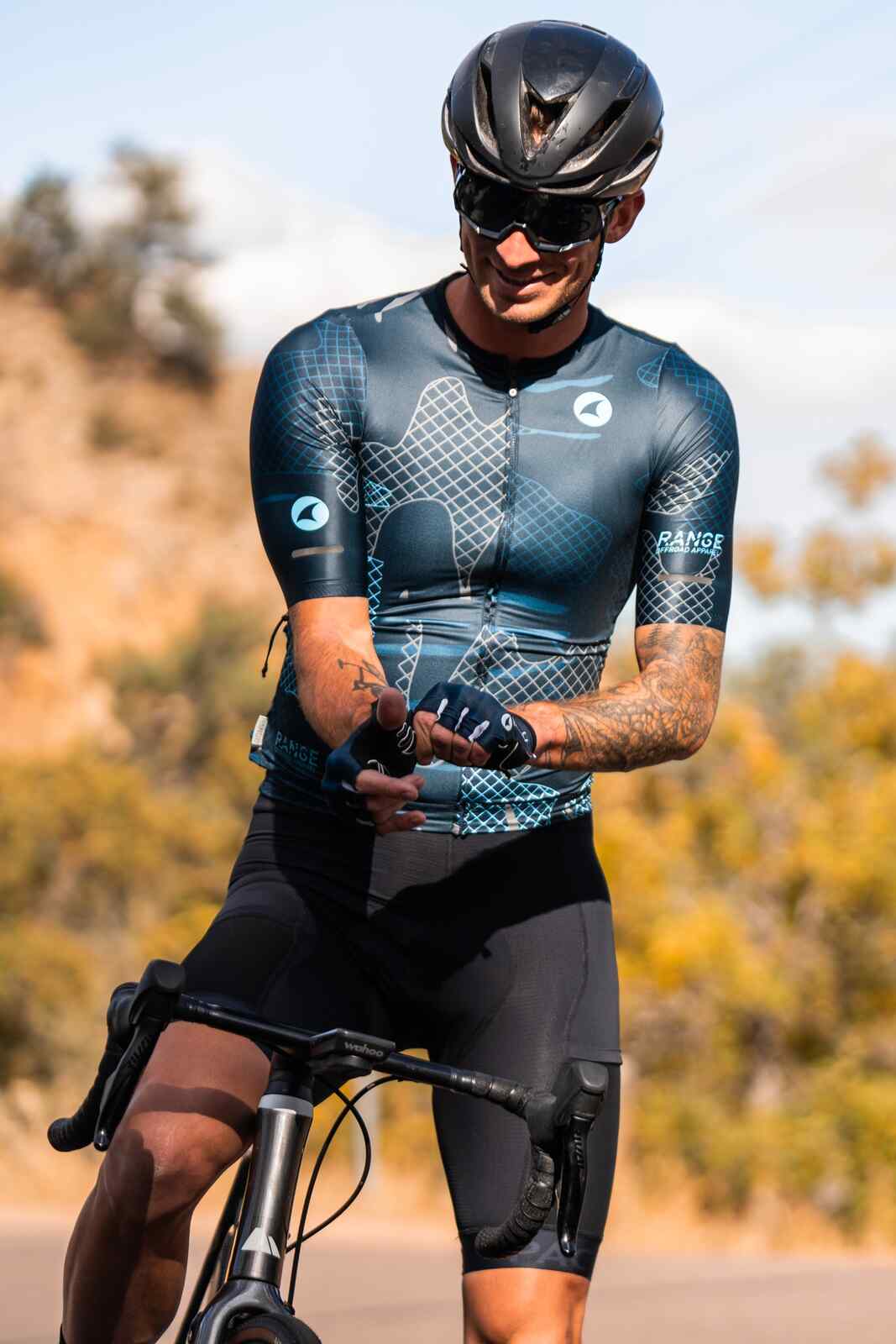 Padded Navy Blue Bike Gloves on Cyclist