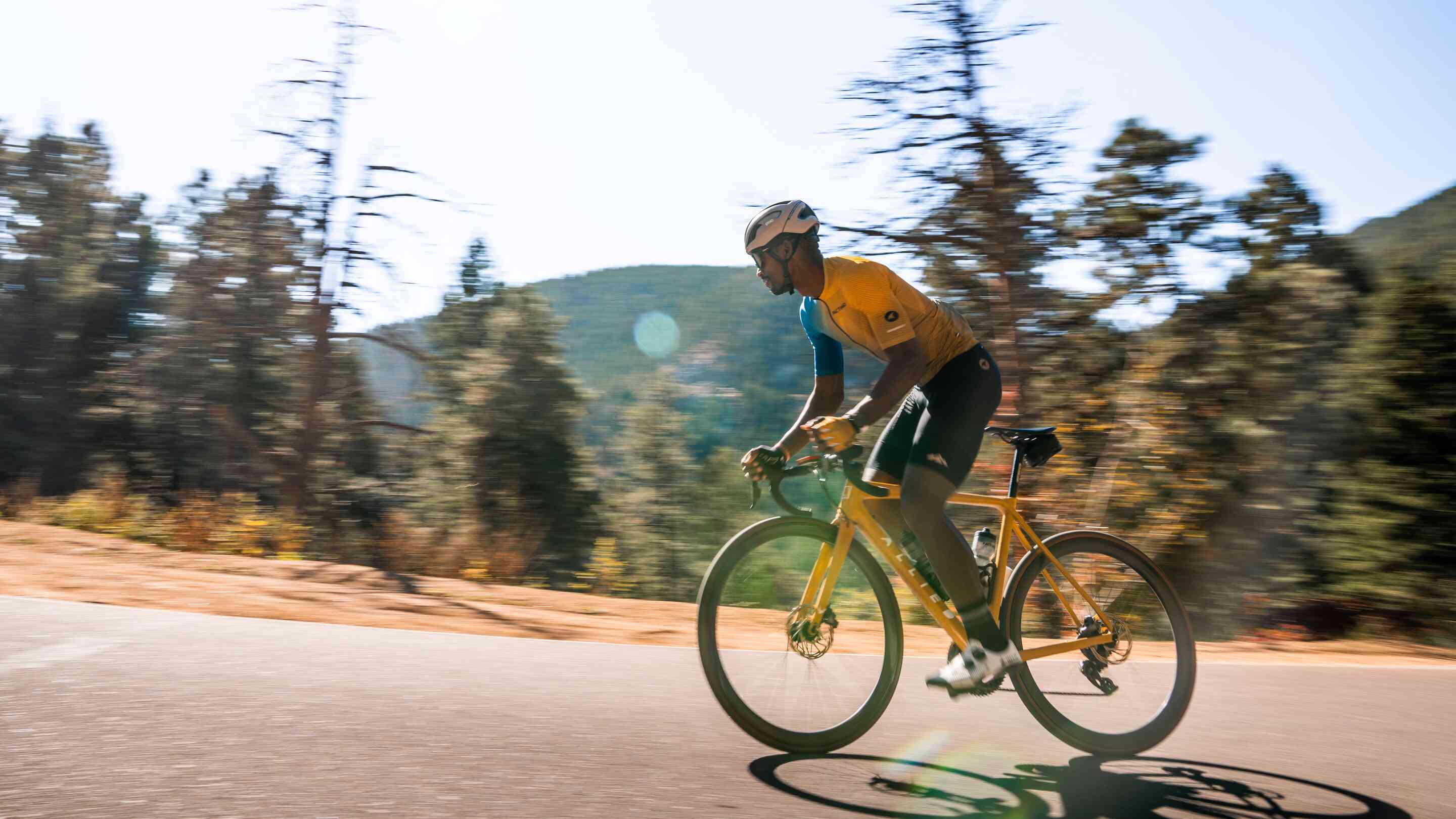 Cyclist in a Golden Yellow Cycling Jersey