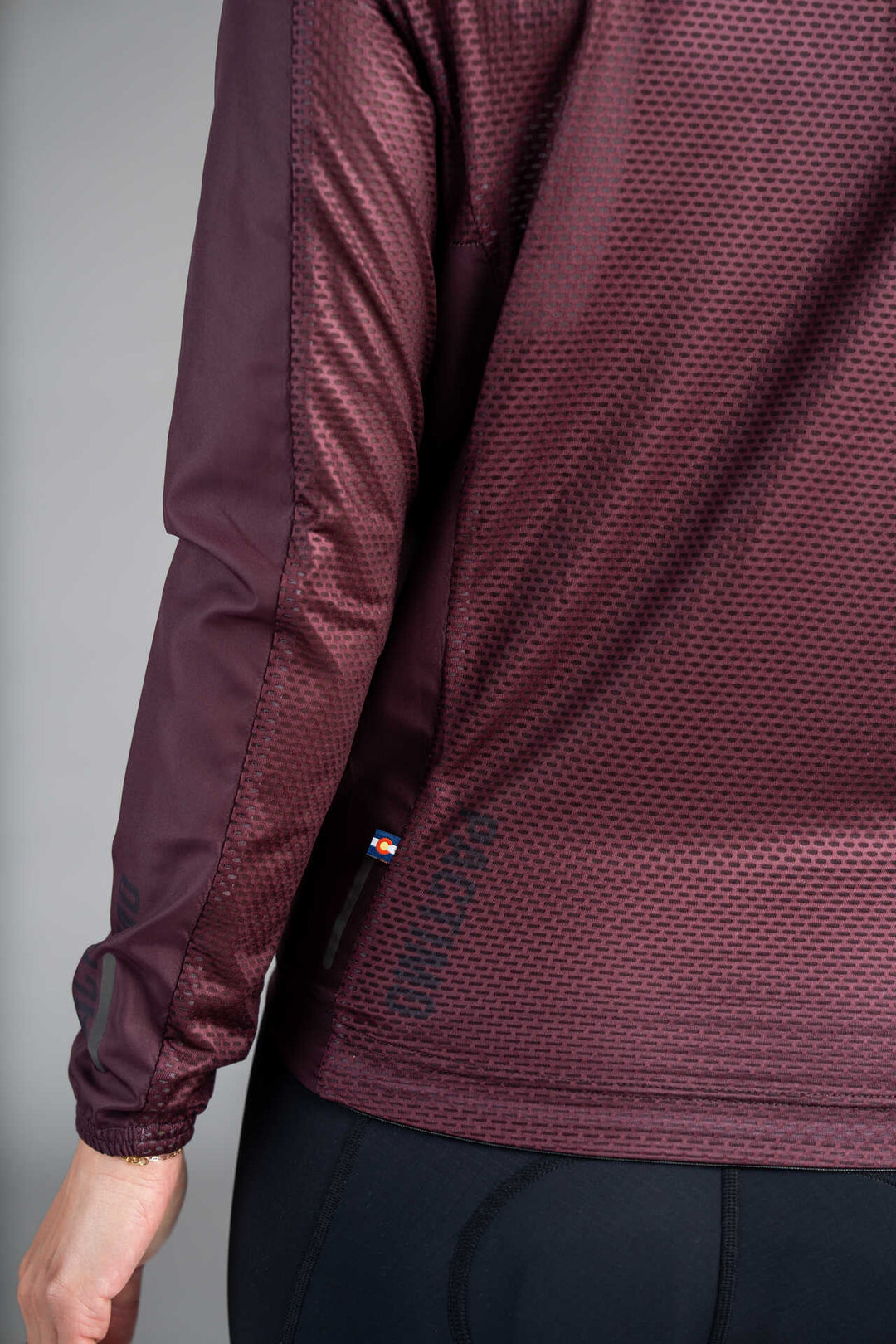 Women's Burgundy Packable Cycling Wind Jacket - Mesh Fabric Close-Up