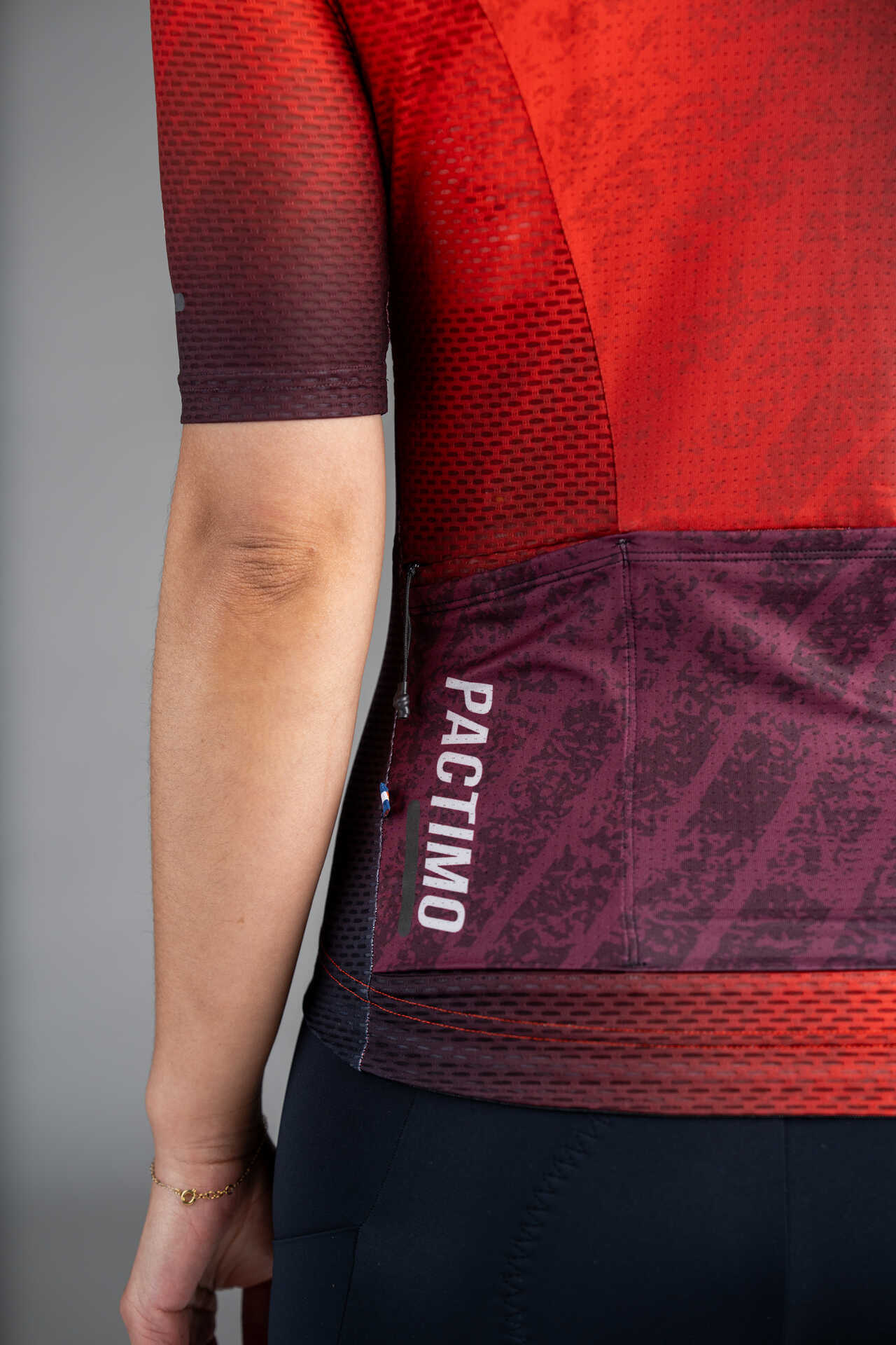 Women's Red Ombre Aero Mesh Cargo Cycling Jersey - Back Pactimo Logo