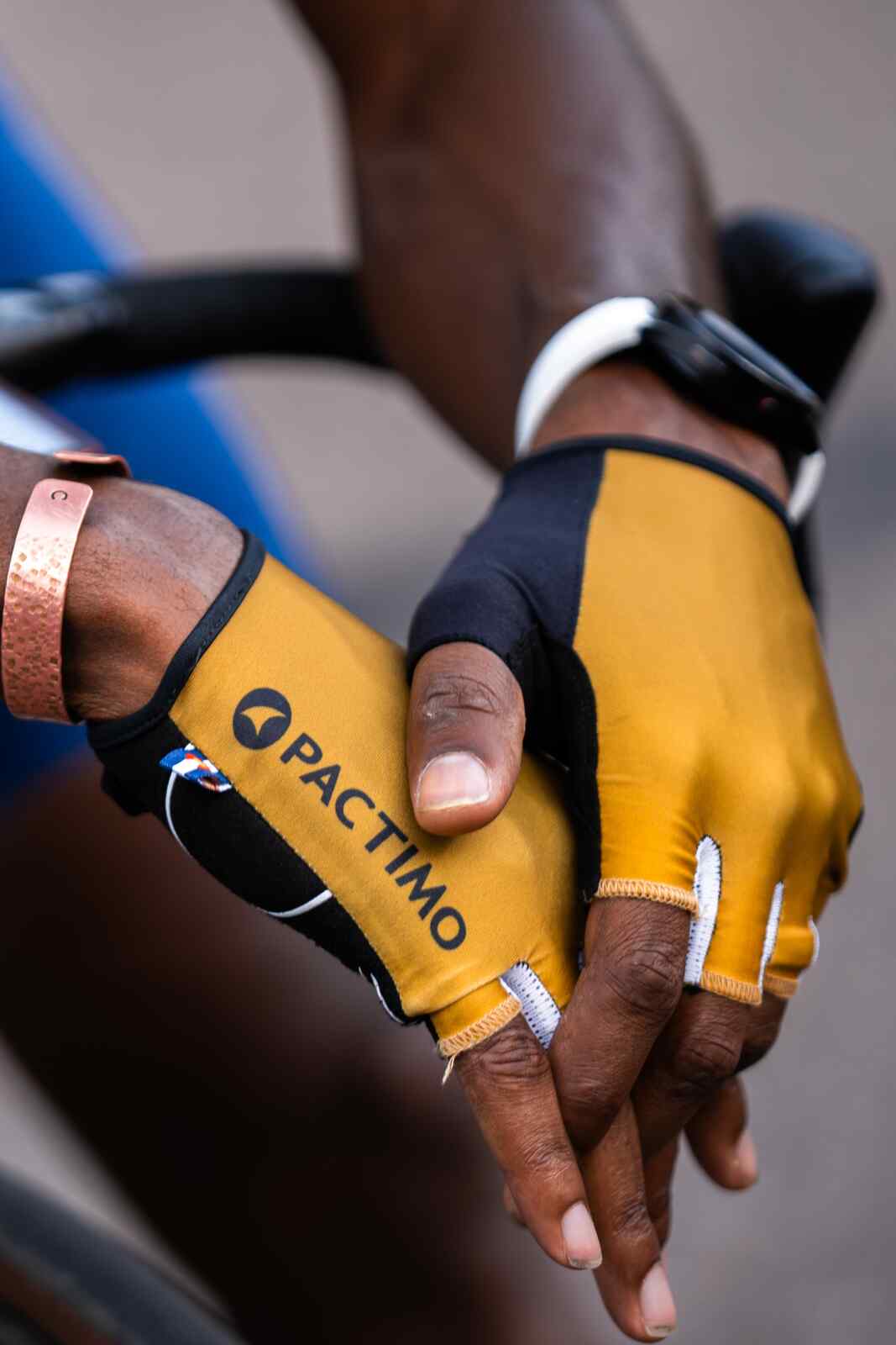 Golden Yellow Cycling Gloves on Cyclist