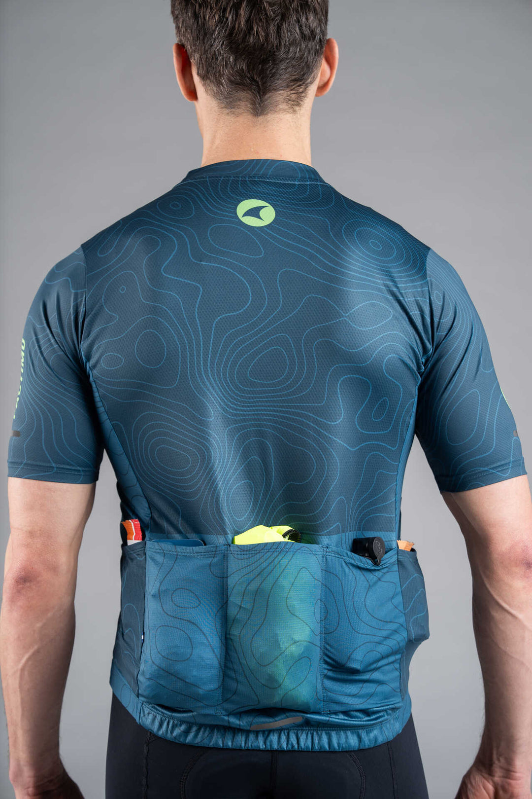 Men's Teal Cargo Cycling Jersey in Teal Topo Design - Back View Pockets Full