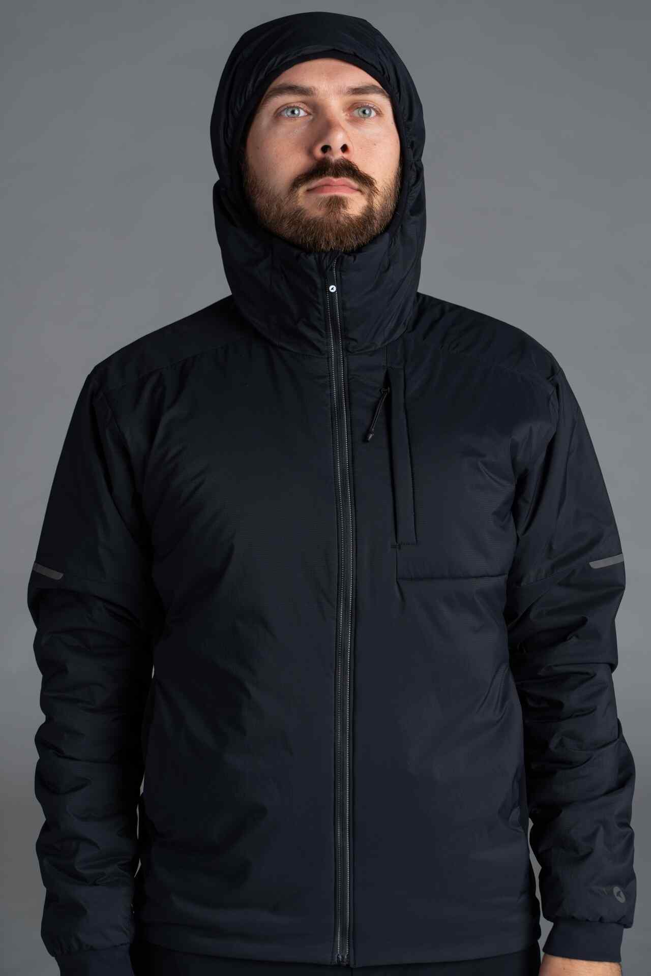 Man wearing Prologue Insulated Jacket with a hood 