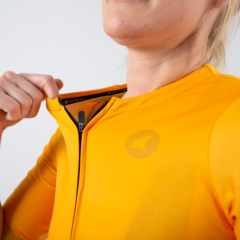 High Quality Women's Cycling Jersey zipper detail #color_mango