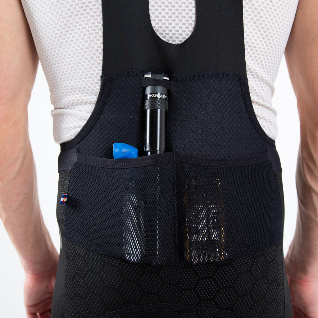 Men's "12-hour" Cargo Bib Shorts - Back Pocket Details #color_black