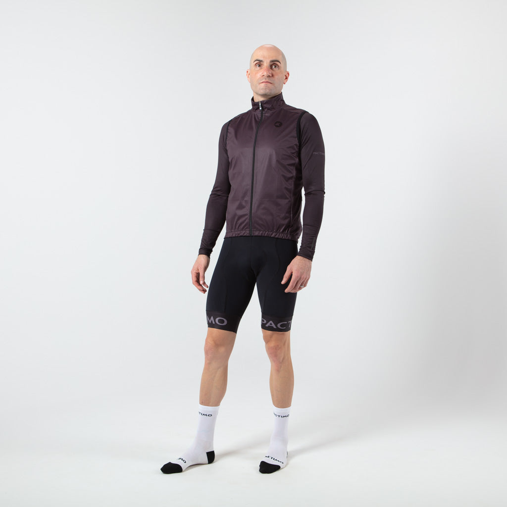 Men's Cool Weather Cycling Vest With Pockets On Body Front #color_charcoal