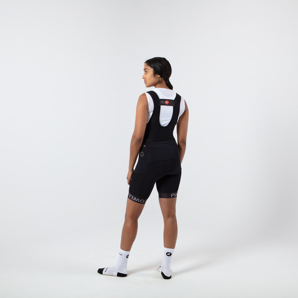 Women's Lightweight Sleeveless Cycling Base Layer - On Body Back Left View #color_white