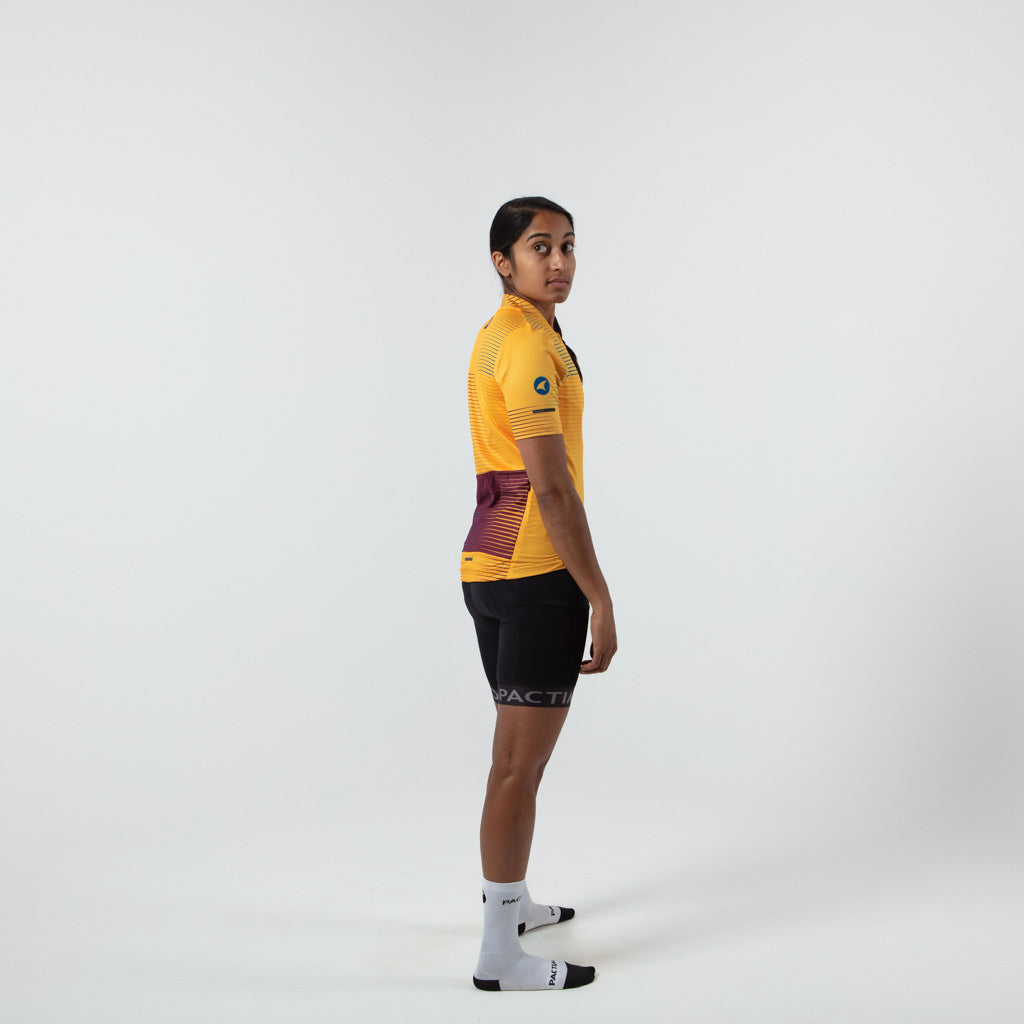 Womens Bike Jersey Convergence Design on body Side View #color_mango