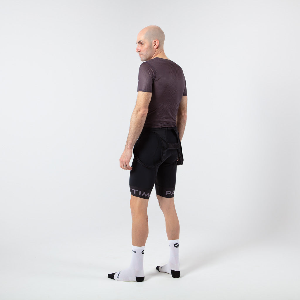 Men's Lightweight Short Sleeve Cycling Base Layer - On Body Left Side View #color_charcoal