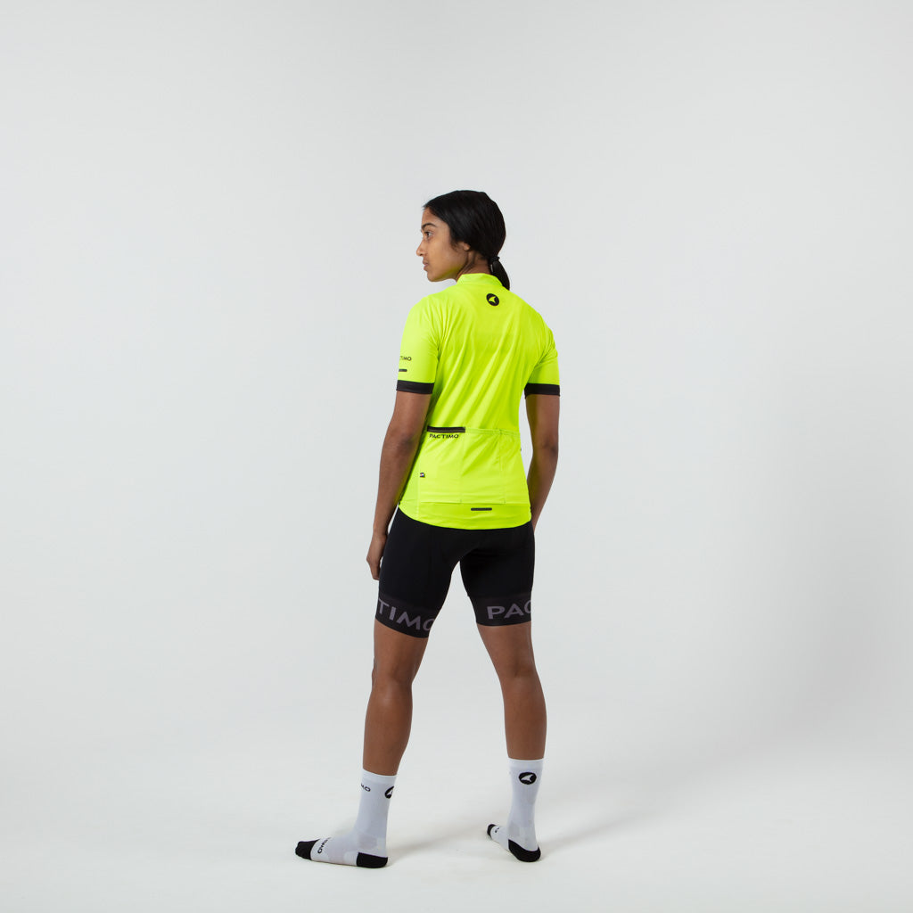 Womens Bike Jersey On Body Back View #color_manic-yellow