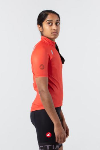 Women's Water-Repelling Cycling Jersey On Body Side View #color_garnet