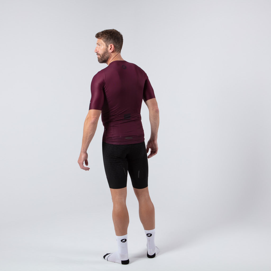 Lightweight Mesh Cycling Jersey for Men On Body Back View #color_mulberry