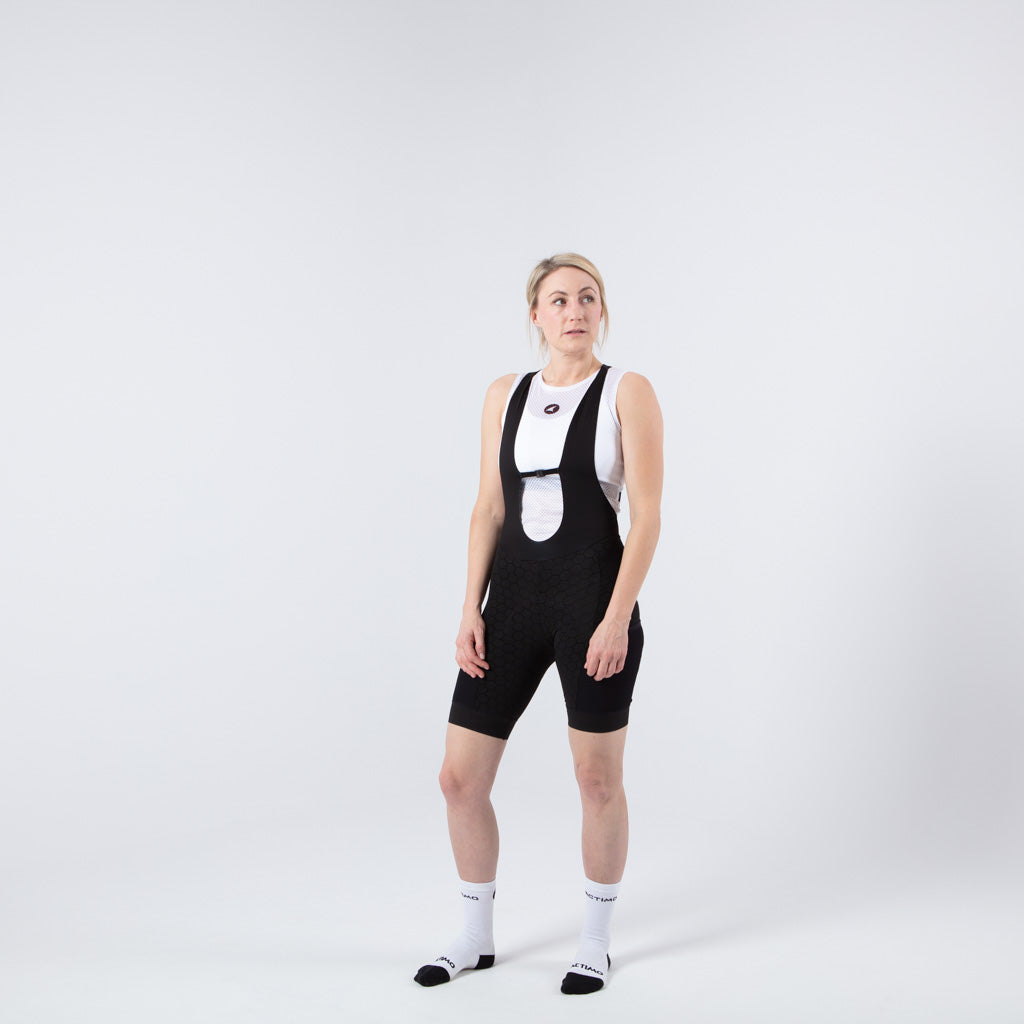 Women's Long Distance Cargo Bib Shorts - on body Front View #color_black