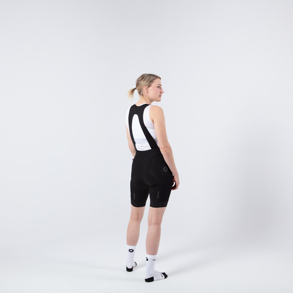 Women's Long Distance Cargo Bib Shorts - on body Back View #color_black
