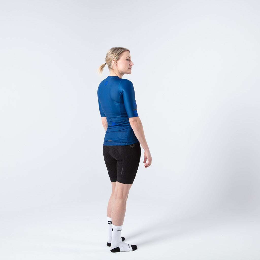 Lightweight Mesh Cycling Jersey for Women On Body Back View #color_navy