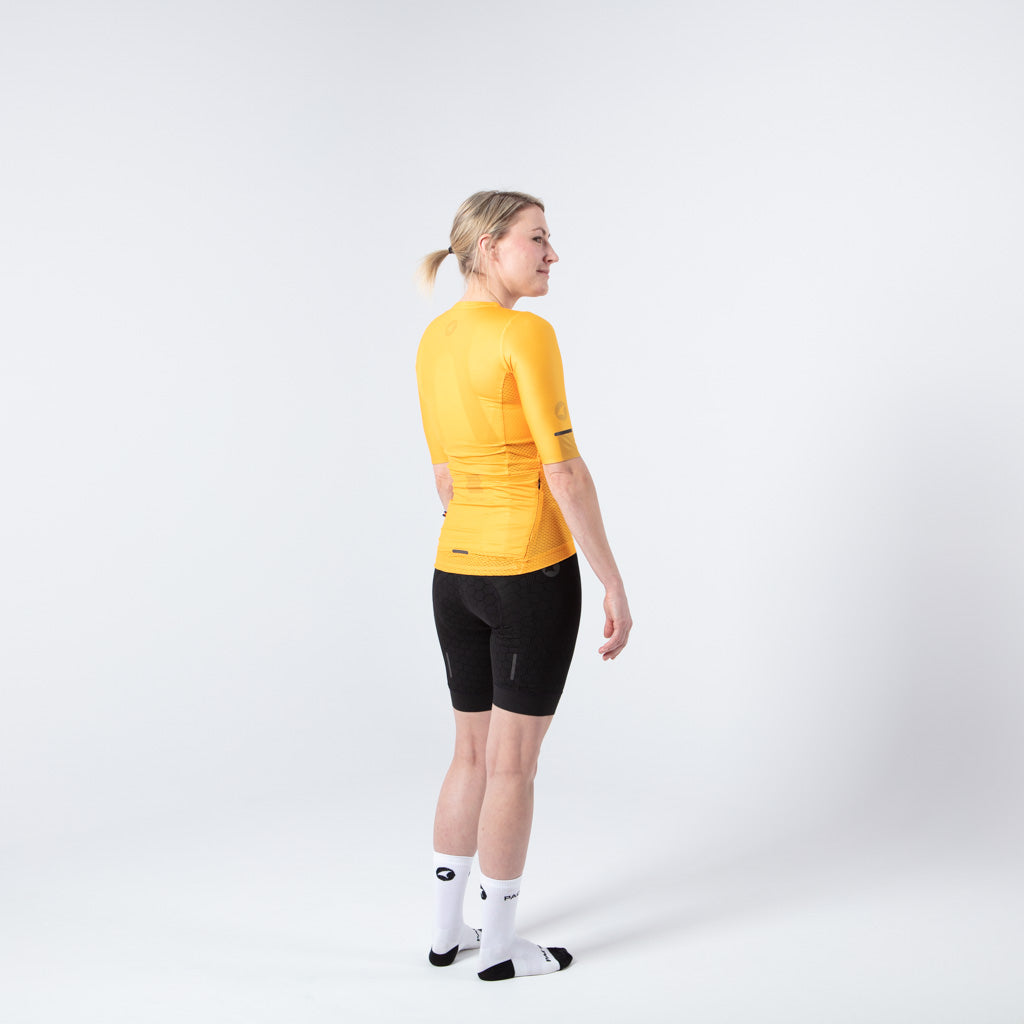Lightweight Mesh Cycling Jersey for Women On Body Back View #color_mango