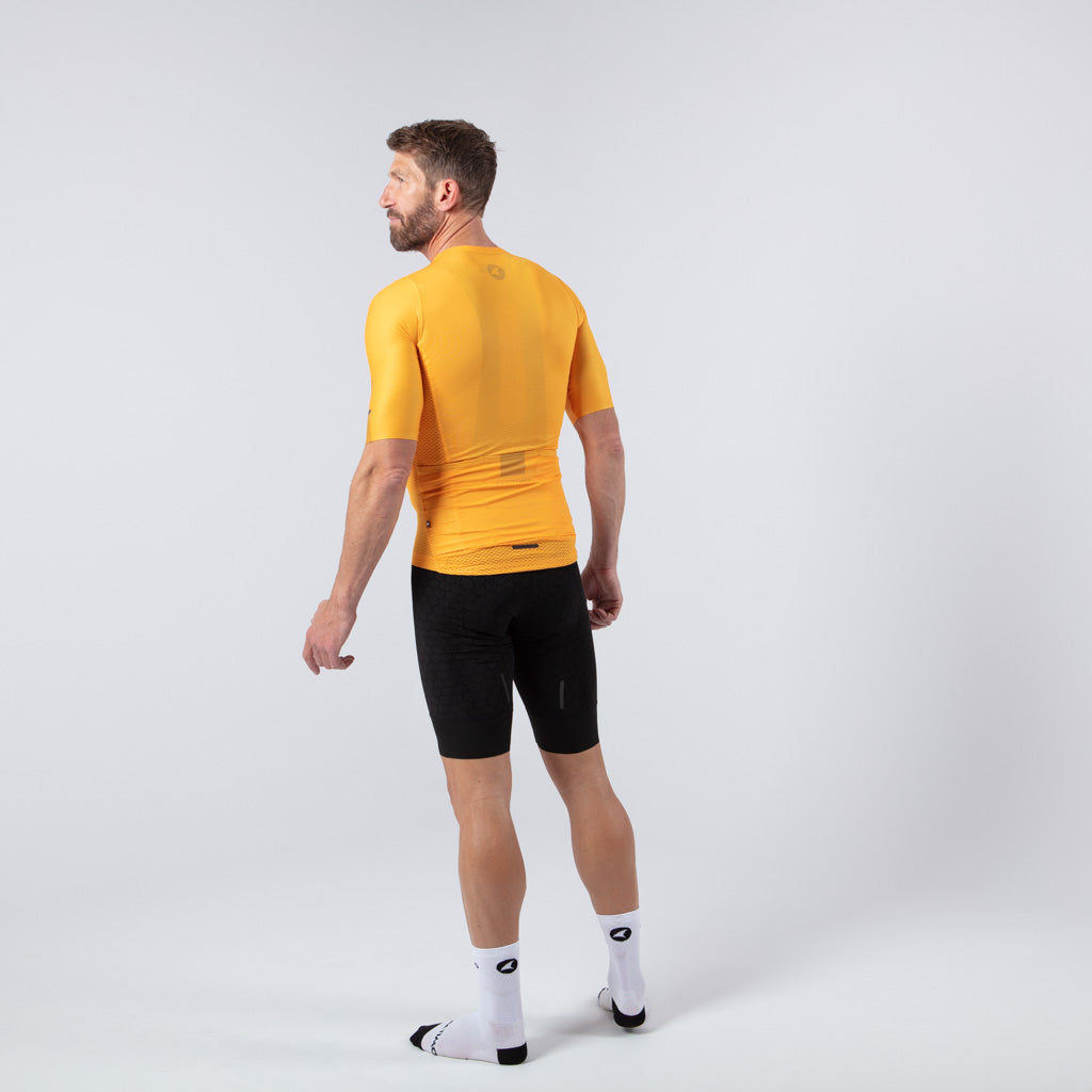 Lightweight Mesh Cycling Jersey for Men On Body Back View #color_mango