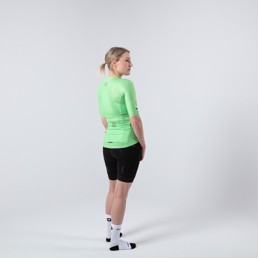 Lightweight Mesh Cycling Jersey for Women On Body Back View #color_washed-lime