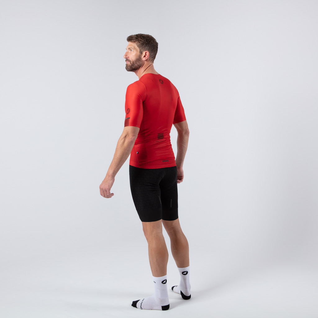 Lightweight Mesh Cycling Jersey for Men On Body Left Side View #color_garnet