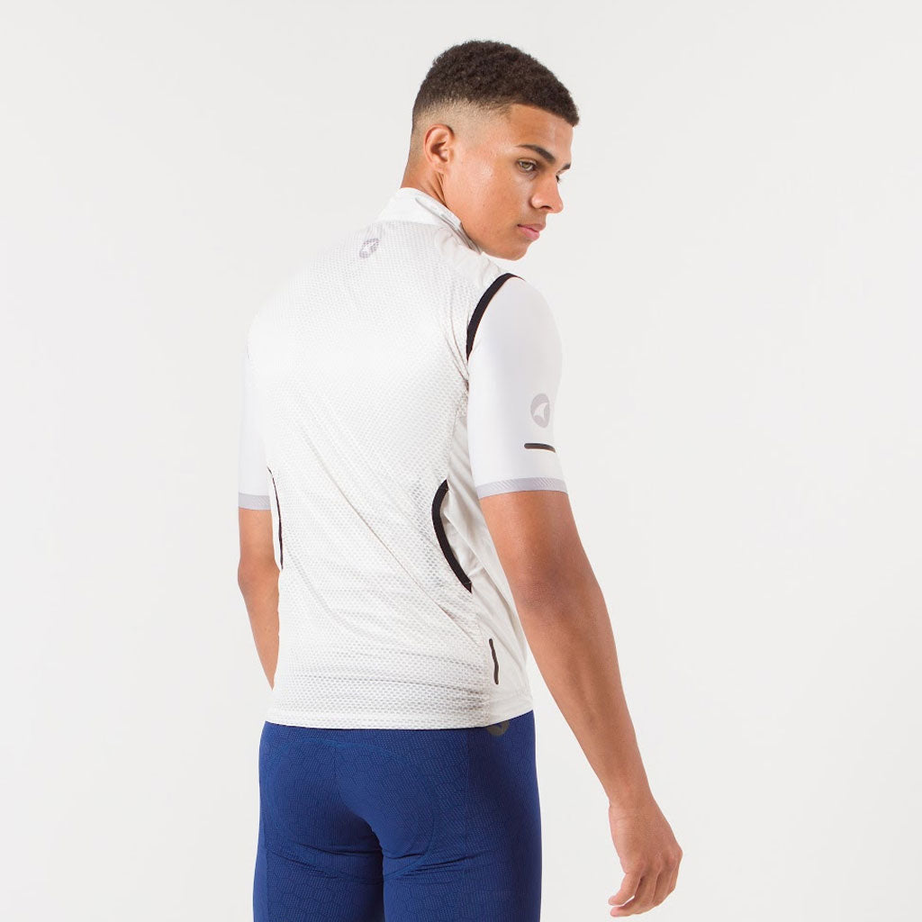 Men's Packable Cycling Wind Vest on body Back View #color_dune