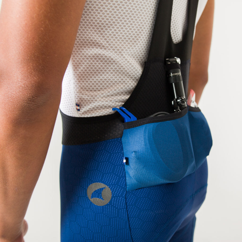 Men's "12-hour" Navy Cargo Bib Shorts - Back Pocket Details #color_navy