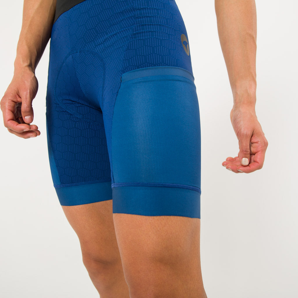 Women's Blue Long Distance Cargo Bib Shorts - Fabric Detail #color_navy