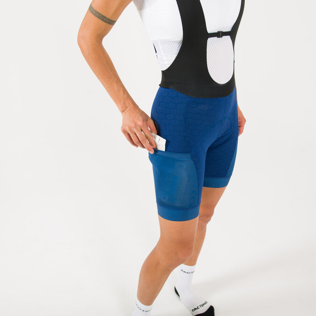 Women's Blue Long Distance Cargo Bib Shorts - Side Pockets #color_navy