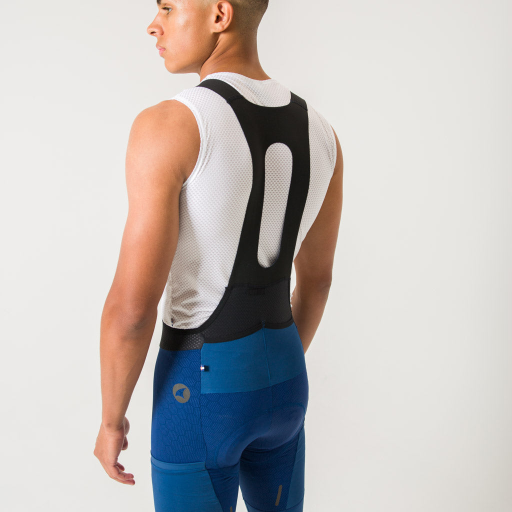 Men's "12-hour" Navy Cargo Bib Shorts - Back Strap Detail #color_navy