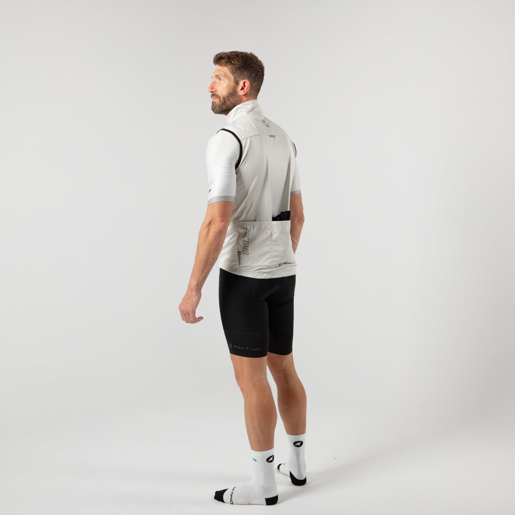 Men's Cool Weather Cycling Vest With Pockets On Body Back Left #color_dune